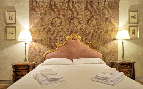 Logement Giardino: chambre à coucher