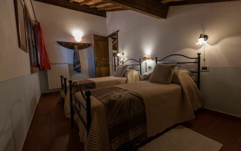 Logement Montelopio 6: chambre à coucher