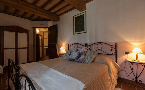 Logement Montelopio 6: chambre à coucher