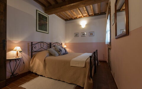 Logement Montelopio 6: chambre à coucher