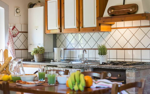 Logement Montelopio 4: Cuisine, Salle à manger, Salon