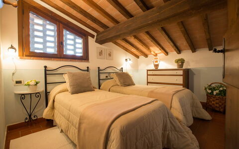 Logement Montelopio 5: chambre à coucher