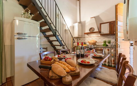 Logement Montelopio 5: Cuisine, Salle à manger, Salon