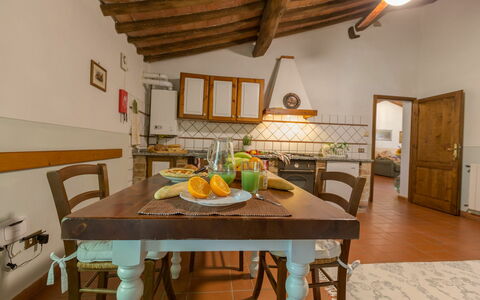 Logement Montelopio 8: Cuisine, Salle à manger, Salon