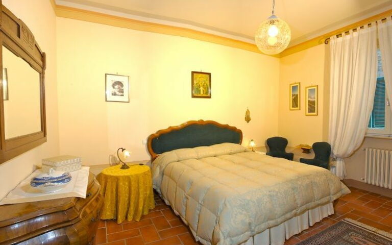 Logement Santo Agostino Dream: chambre à coucher