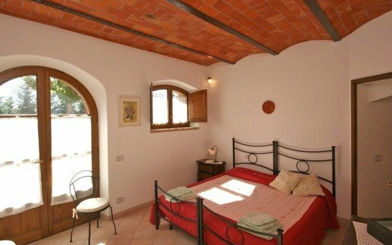Logement Pienza a: chambre à coucher