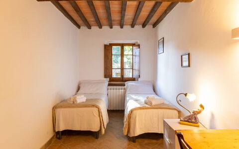 Logement Boscaiolo: chambre à coucher