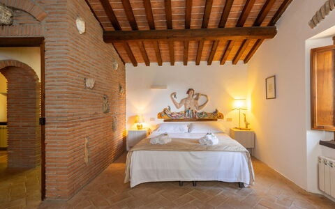 Logement Boscaiolo: chambre à coucher