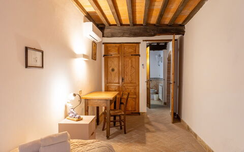 Logement Boscaiolo: chambre à coucher