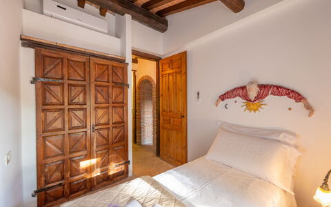 Logement Boscaiolo: chambre à coucher