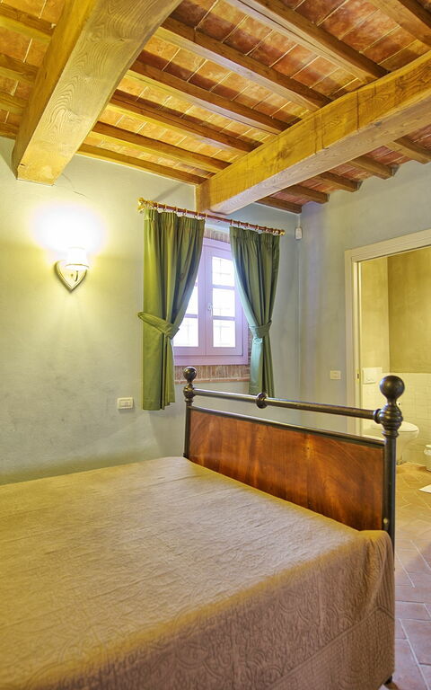 Villa Marginone: chambre à coucher