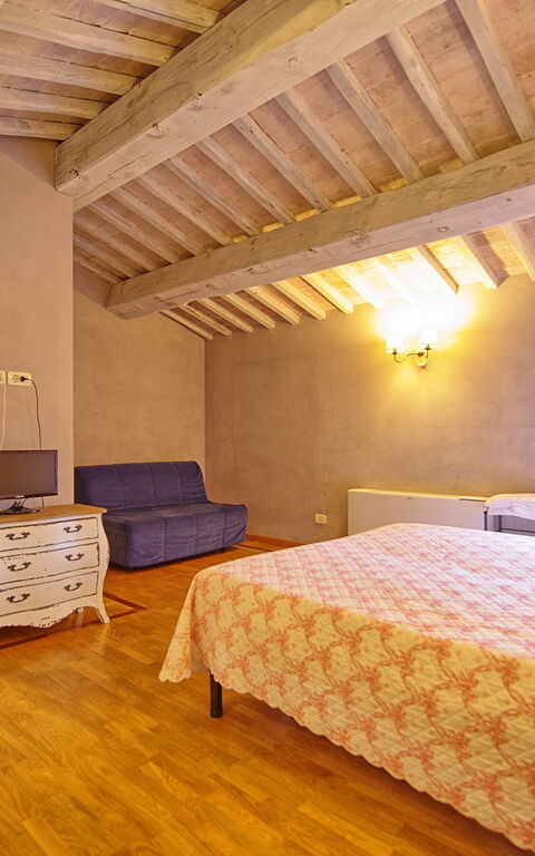 Villa Marginone: chambre à coucher