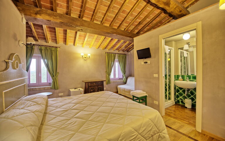 Villa Marginone: chambre à coucher