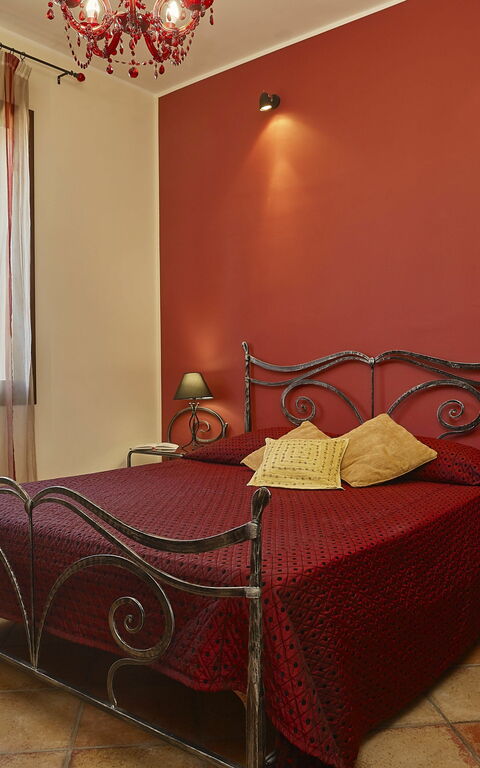 Villa Oasi: chambre à coucher