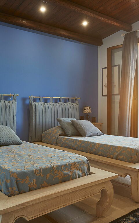 Villa Oasi: chambre à coucher