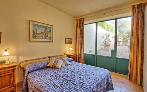 Logement Il Cottage: chambre à coucher