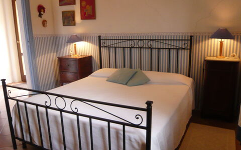 Logement Casetta: chambre à coucher