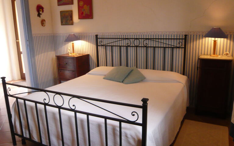 Logement Casetta: chambre à coucher