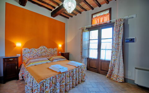 Logement Granaio Apartment: chambre à coucher