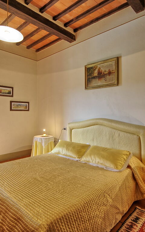 Villa Capolona: chambre à coucher