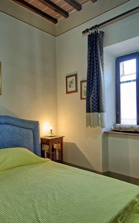 Villa Capolona: chambre à coucher