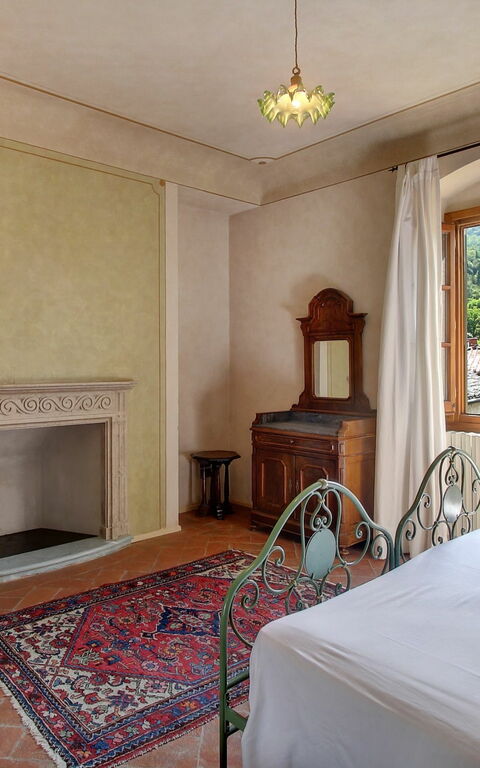 Villa Lucolena: chambre à coucher