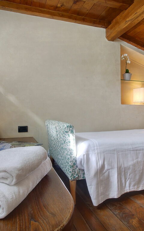 Villa Lucolena: chambre à coucher