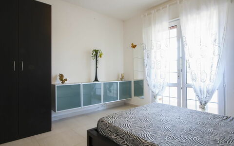 Logement Cotriero Crystal: chambre à coucher