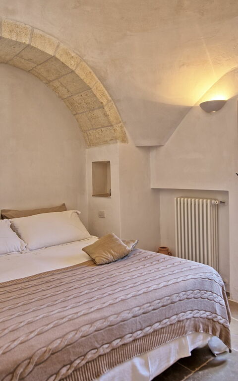 Trullo Pascarosa: chambre à coucher