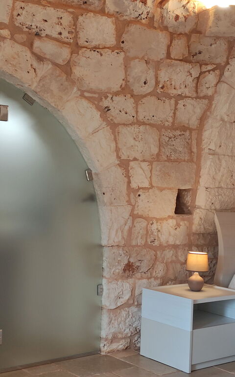 Trullo Santo Stefano: chambre à coucher, Salle de bain