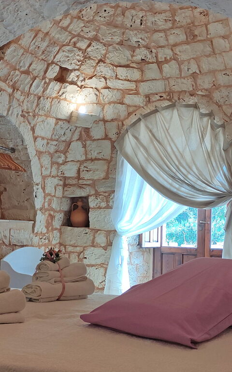 Trullo Santo Stefano: chambre à coucher