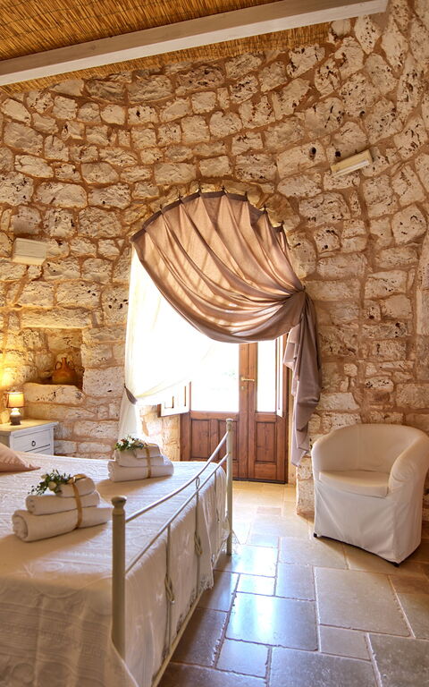 Trullo Santo Stefano: chambre à coucher