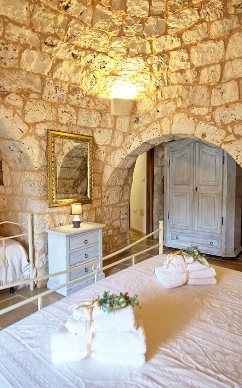 Trullo Santo Stefano: chambre à coucher