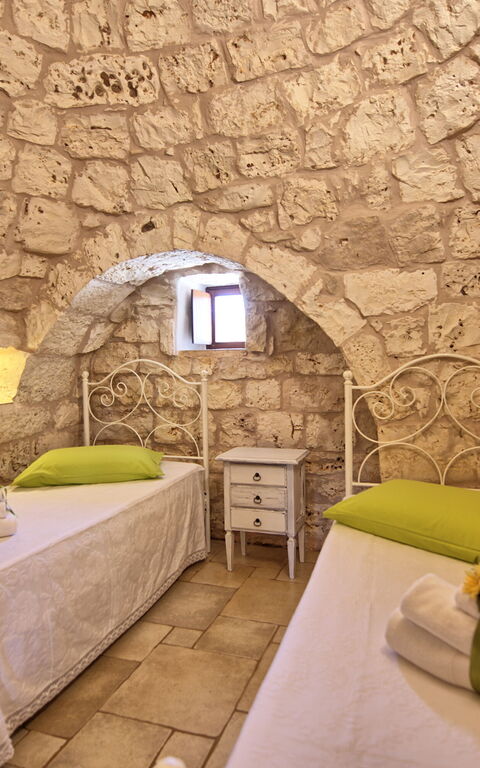 Trullo Santo Stefano: chambre à coucher