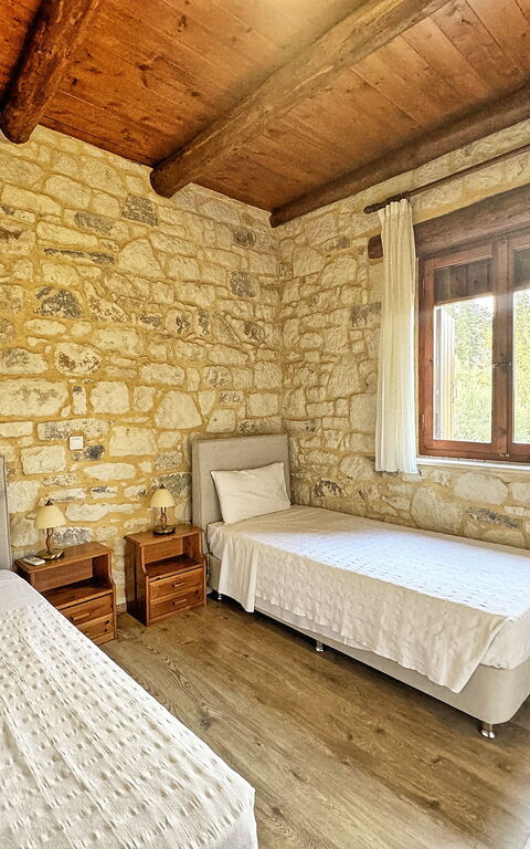 Villa Nipos: chambre à coucher