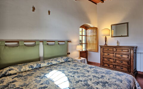 Logement Loggiato: chambre à coucher