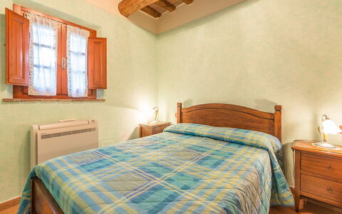 Logement Smeraldo: chambre à coucher