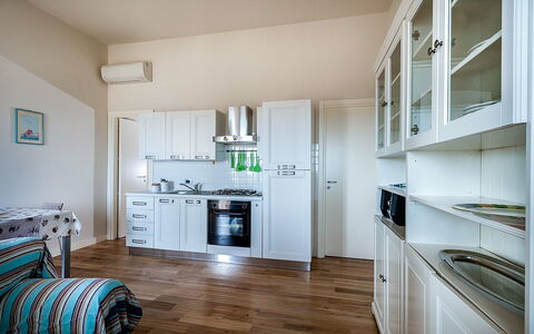 Logement Timone: Cuisine, Salle à manger, Salon