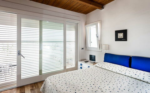 Logement Onda: chambre à coucher