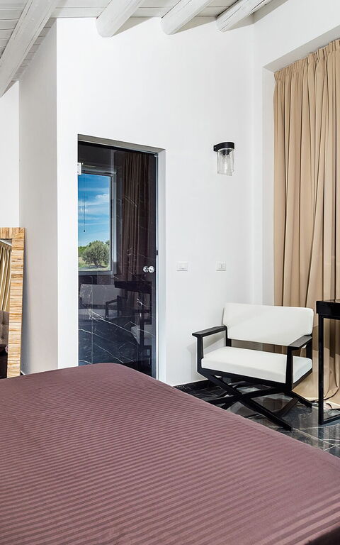 Villa Contra: chambre à coucher