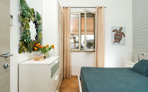 Logement Kalika: chambre à coucher