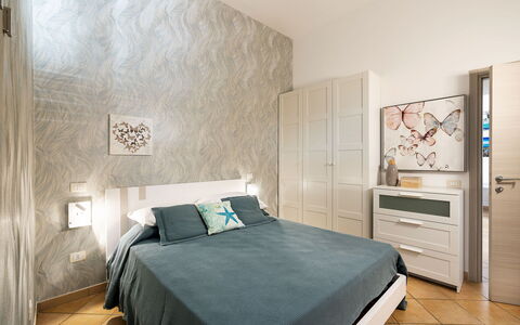 Logement Kalika: chambre à coucher