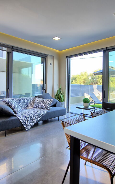 Villa Maripol: Salle à manger, Salon