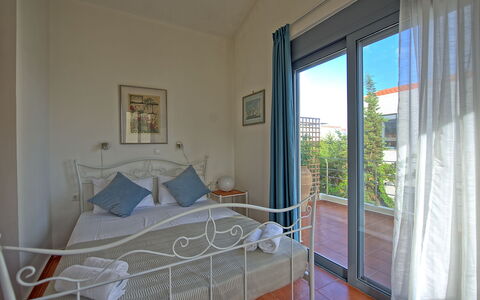 Logement Kastellina: chambre à coucher