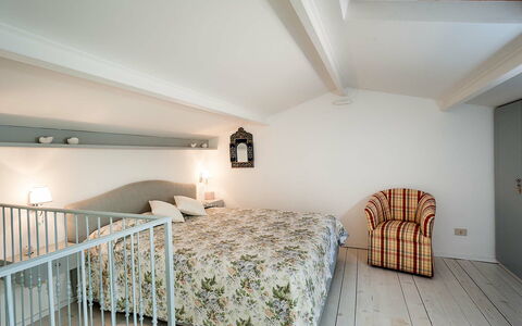 Logement Casetta: chambre à coucher