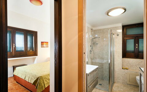Logement Lampara: chambre à coucher, Salle de bain