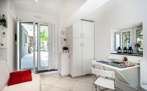 Logement Conchiglia: Cuisine, Salle à manger, Salon