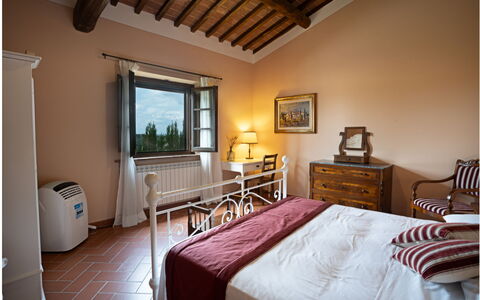 Logement Torri: chambre à coucher