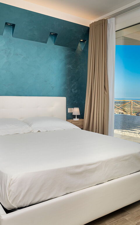 Villa Domizia: chambre à coucher