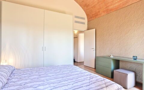 Logement La Pergola: chambre à coucher